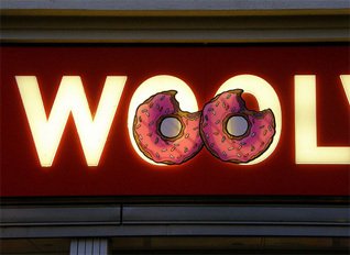 (Do) nuts about Woolworths - Matt Groening. The Simpsons creator kindly allowed Wooly and Worth to appear in a Simpson's style commercial, while Homer's donuts found their way on to the fascia of fity stores, promoting the Simpsons Movie