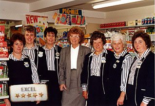 Store Manager Heather Grant introduces her 'Excellent' team from Woolworths Haslemere in 1987. Within a week of the launch of the initiative every member of her team had completed every stage.