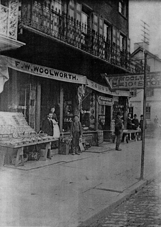 The team pose for a photo outside the first Woolworth store