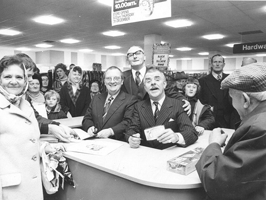 Television stars Windsor Davies and Don Estelle of 'It ain't half hot mum' proved a big hit with shoppers at the opening of a huge new Woolworth superstore in Bishops Stortford in December 1978