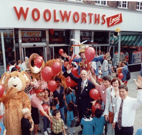 MD Roger Jones (centre), PR Executive Cathy Young and Proposition Manager Steve Langton (Right foreground) open the new-look Woolworths Local store in Greenford, Middlesex in 1997
