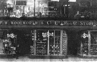 The flagship F.W. Woolworth Store near Marble Arch in Edgware Road, London, W2 was the first to open right in the heart of the metropolis, pre-dating Oxford Street, Holborn and The Strand by more than ten years. This rare image shows the original galleried frontage before the faience cinema front was added in the 1930s.