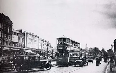 The northern end of Brixton Road between Electric Avenue and Coldharbour Lane shortly before the forecourt (behind the trams) was removed in a major redevelopment scheme to bring the building line forward undertaken by the Property Department of F.W. Woolworth and Co. Ltd. in the mid 1930s. Image courtesy of Lambeth Archives.