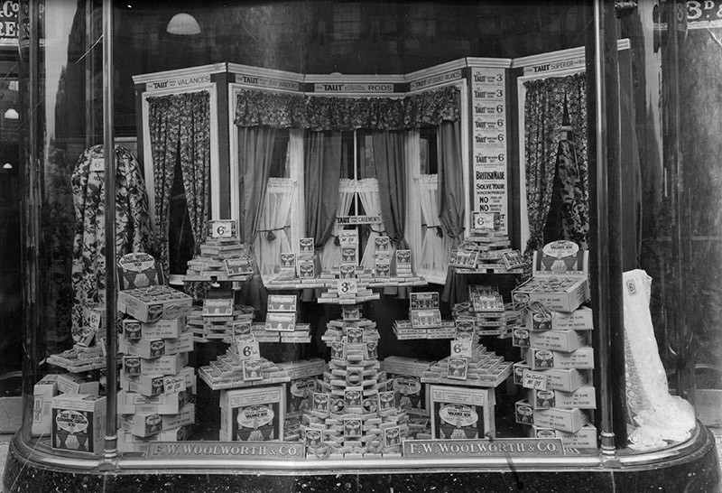 The magnificent, and highly original, display window created by Phil Picot for his brother's Grand Re-opening at Woolworth's store in St John's Road, Clapham Junction. With help from one of the master carpenters who had installed the mahogany counters and pitched pine floor, he had put the off-cuts to use to create an elaborate room setting, and had showcased the full array of drapes, nets, wires and rods from a new enlarged range of Curtain Accessories in the newly-extended Cabinet Makers' and Builders' Hardware (DIY or Dept. 25) range,