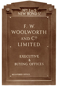 The nameplate of the F.W. Woolworth British HQ at 1-5 New Bond Street, London, W1. The retailer was based at this address from 1931 to 1959.