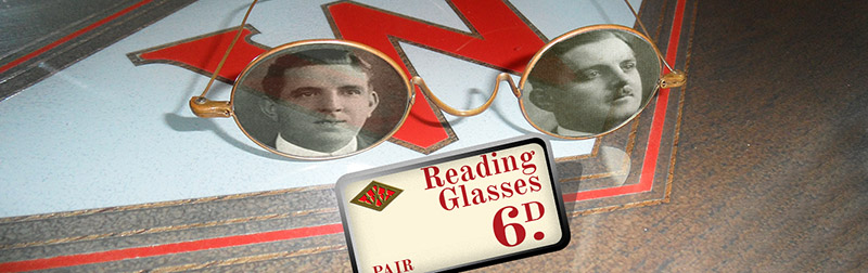 A pair of sixpenny reading glasses from the Picot Woolworth's in South Shields. Reflected in the lenses are Frank (Left) and George (Right). The brothers brought a sharp focus to the store's layout.