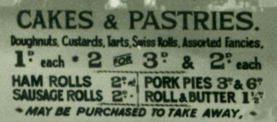 A sign showcasing the exceptionally low prices at the Woolworth's Cafe Bar. Pastries were just one penny, a cup of tea tuppence, and the most expensive main meal was sixpence.